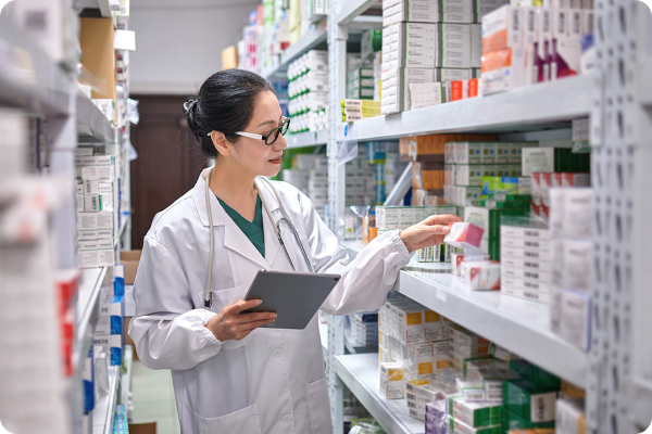 pharmacist checking different medications