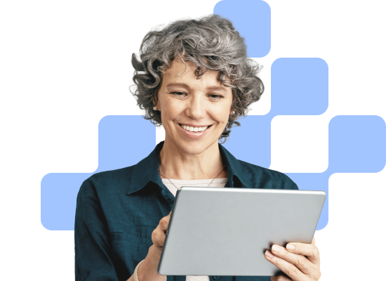woman smiling holding a tablet