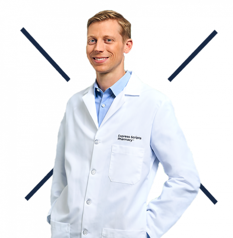 Pharmacist smiles at the camera.