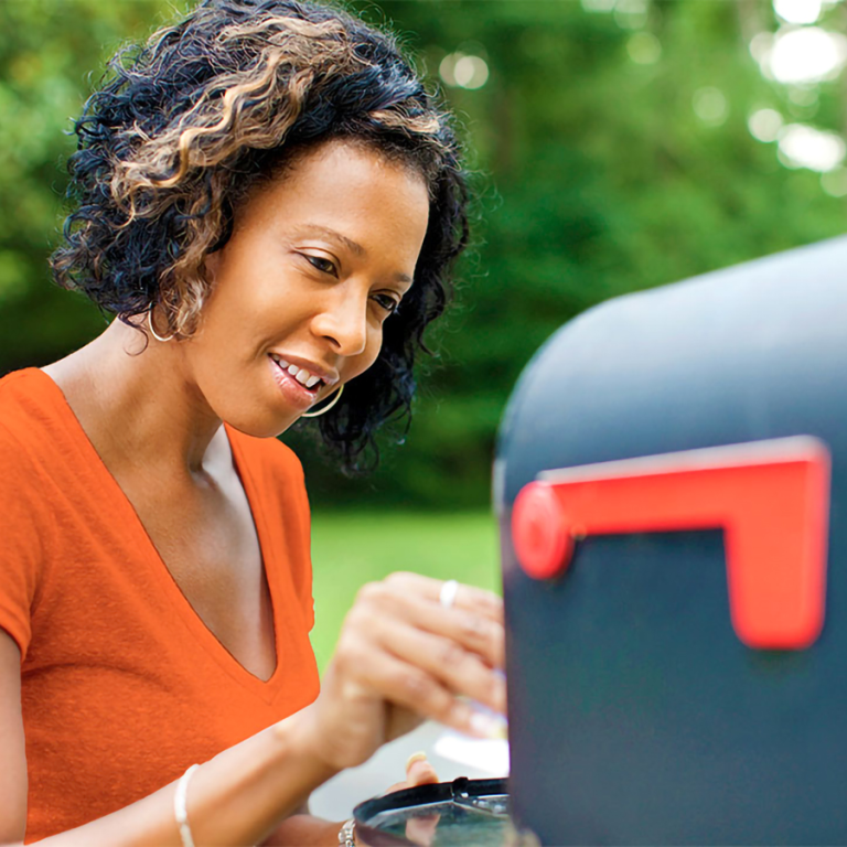 Woman at the mailbox