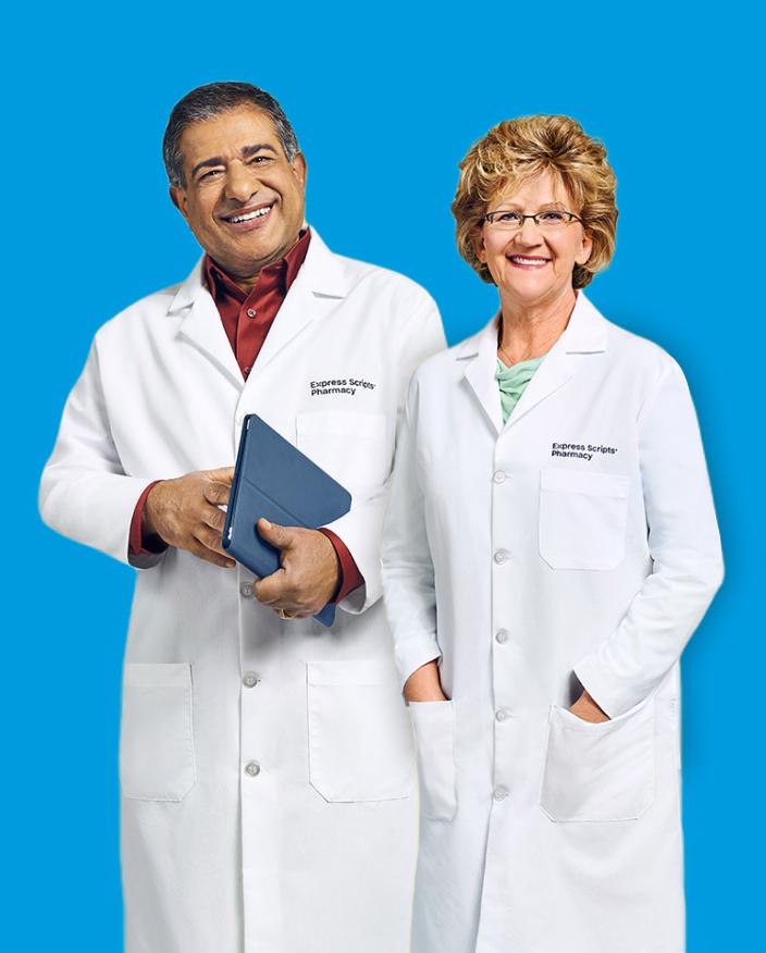 Two smiling pharmacists